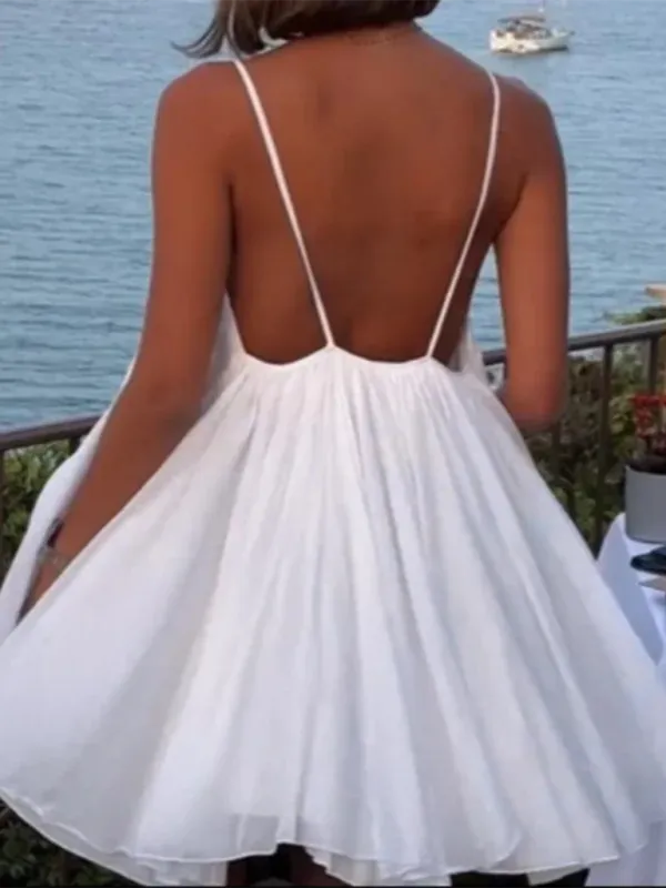 Backless Mini Dress with Pleated Hem and Spaghetti Straps