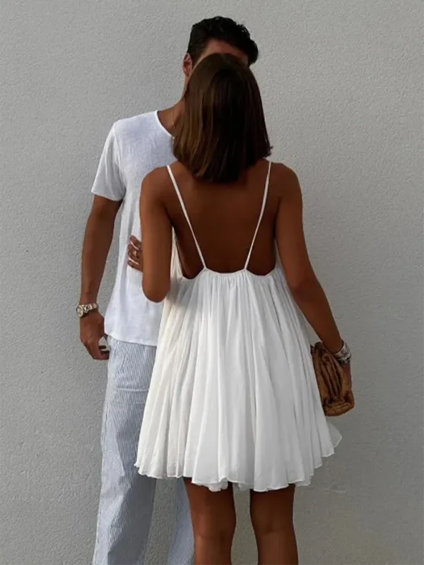 Backless Mini Dress with Pleated Hem and Spaghetti Straps