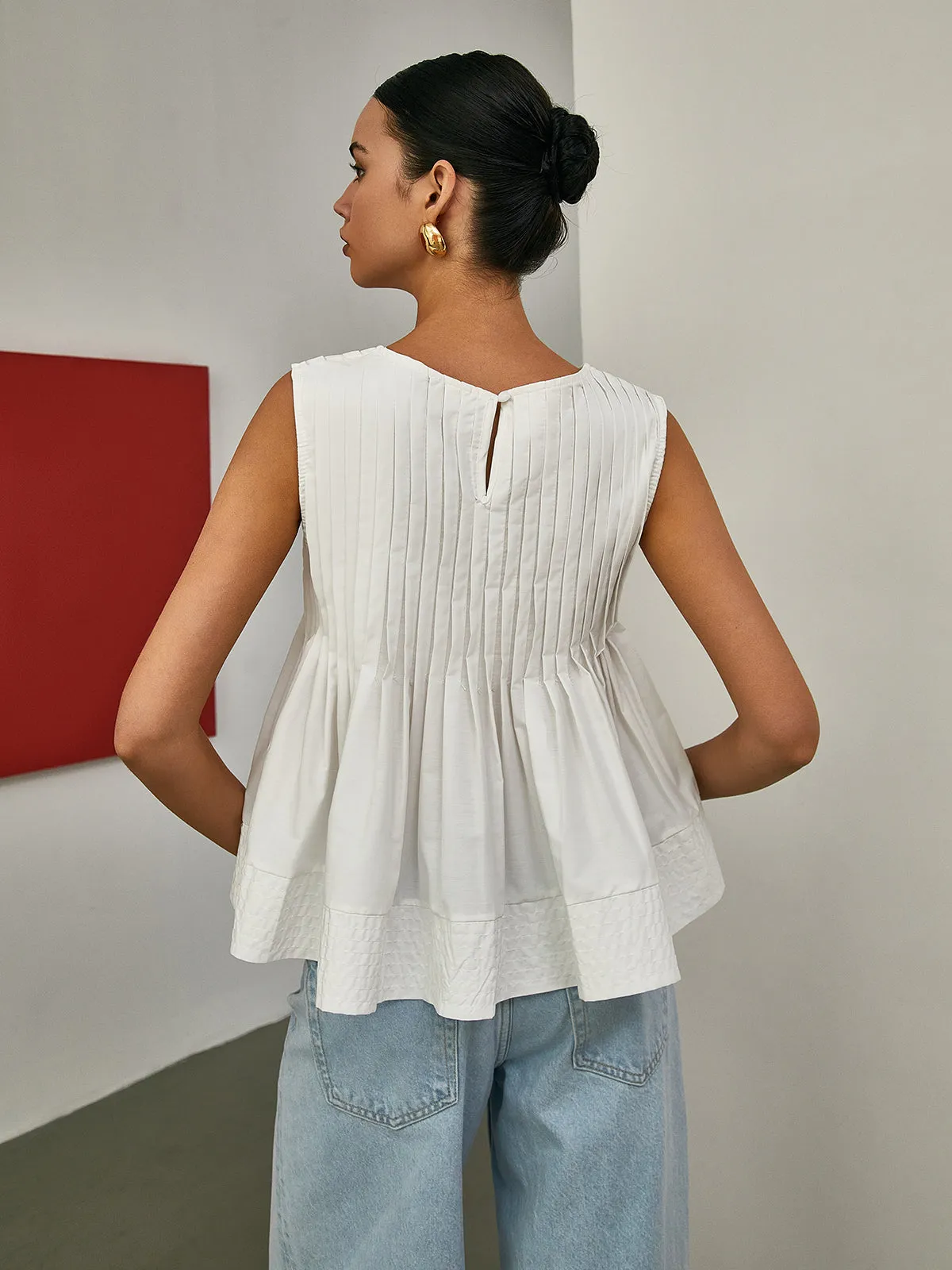 Brenya® | Pleated Peplum Sleeveless Blouse