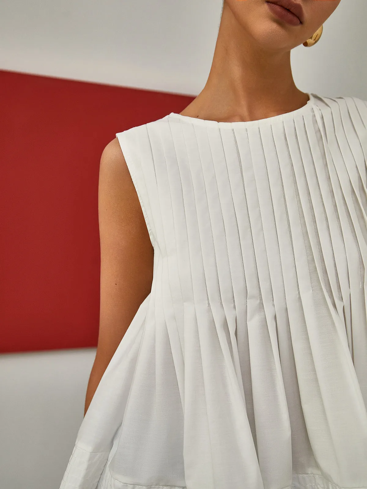 Brenya® | Pleated Peplum Sleeveless Blouse