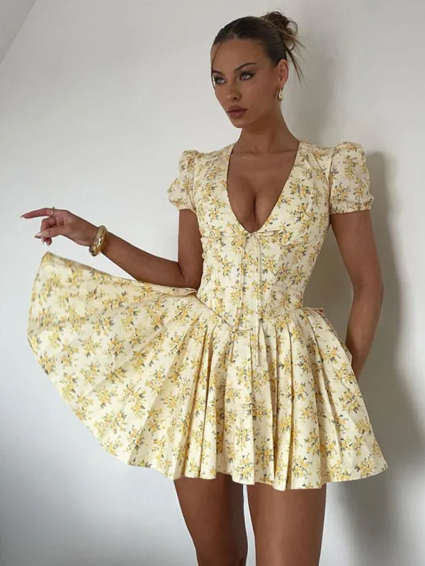 Deep V-Neck Mini Dress with Floral Print and Pleated Skirt
