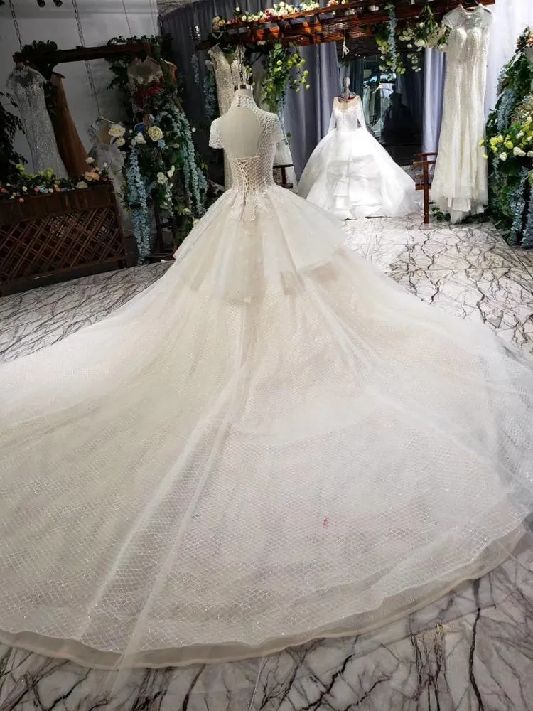 HTL635  high neck cap sleeves keyhole back with cathedral train Arab wedding dress