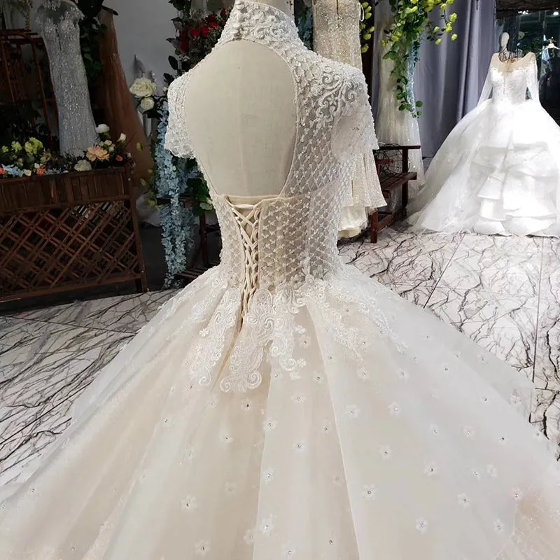 HTL635  high neck cap sleeves keyhole back with cathedral train Arab wedding dress