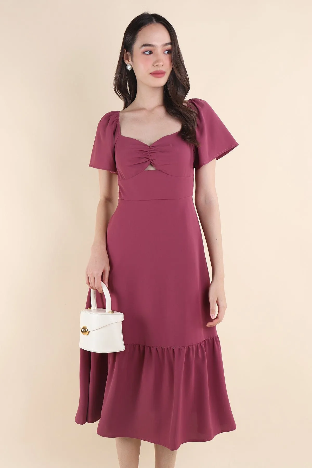 NATALY CUT-OUT MIDAXI DRESS IN MAGENTA