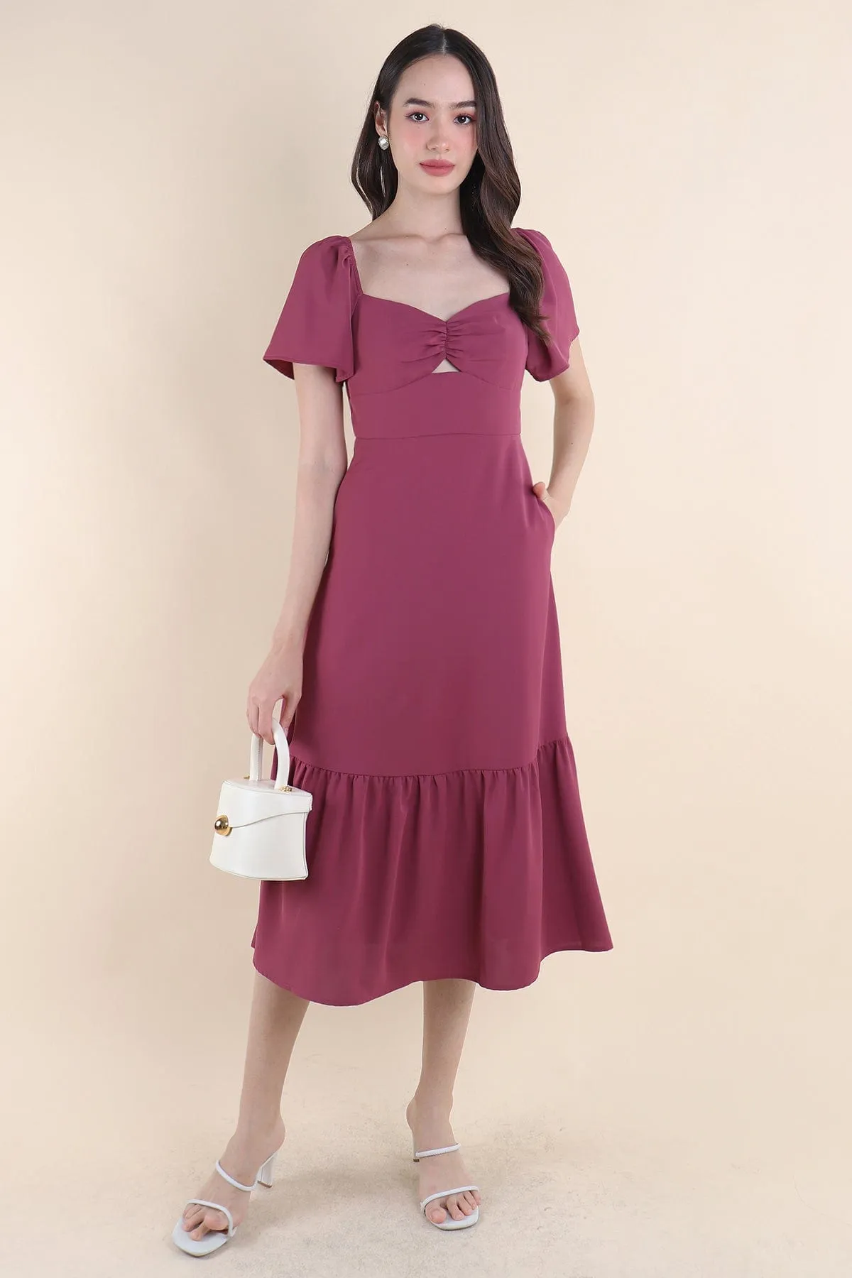 NATALY CUT-OUT MIDAXI DRESS IN MAGENTA