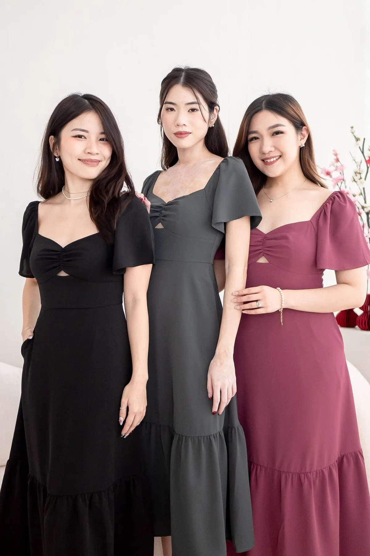 NATALY CUT-OUT MIDAXI DRESS IN MAGENTA