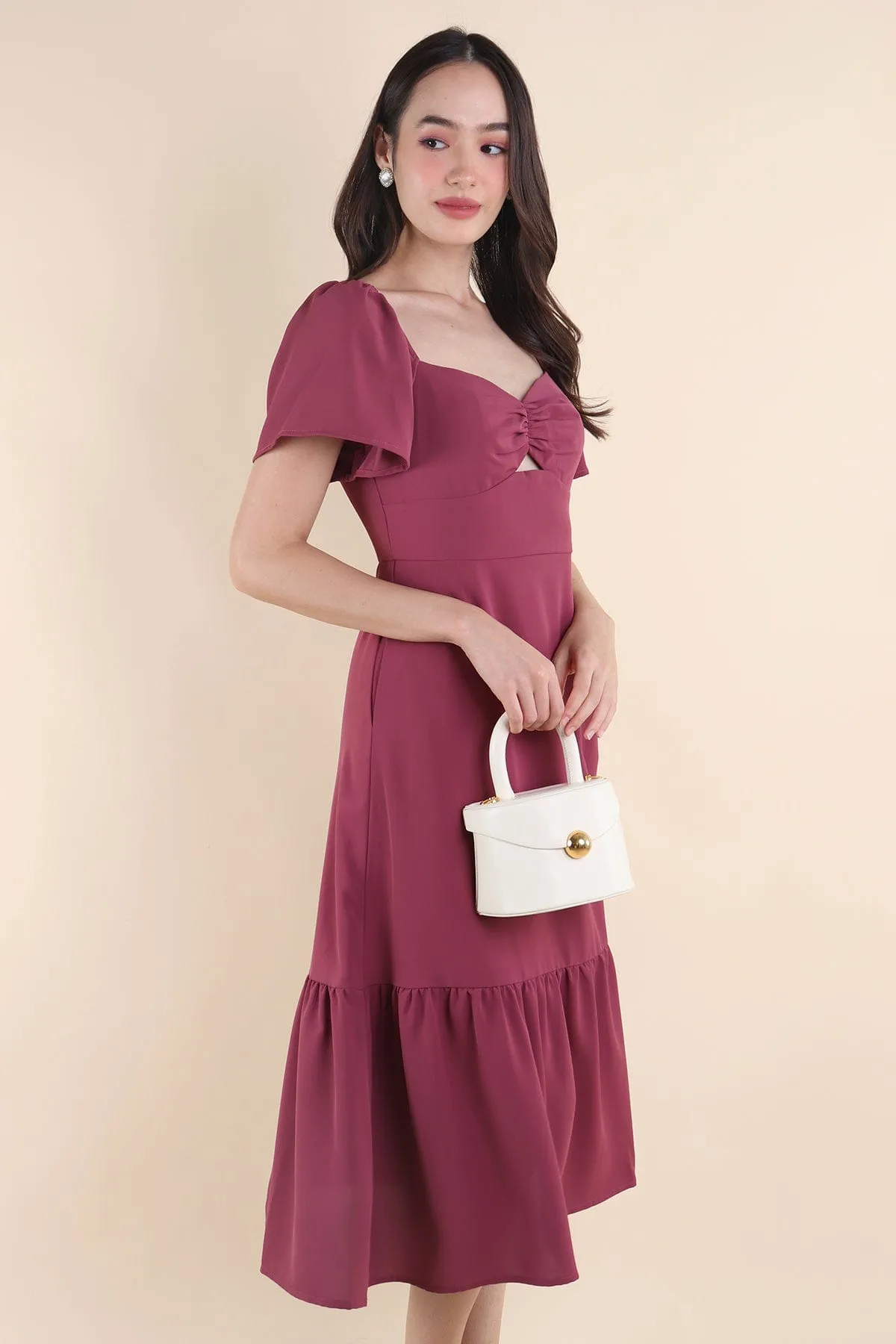 NATALY CUT-OUT MIDAXI DRESS IN MAGENTA