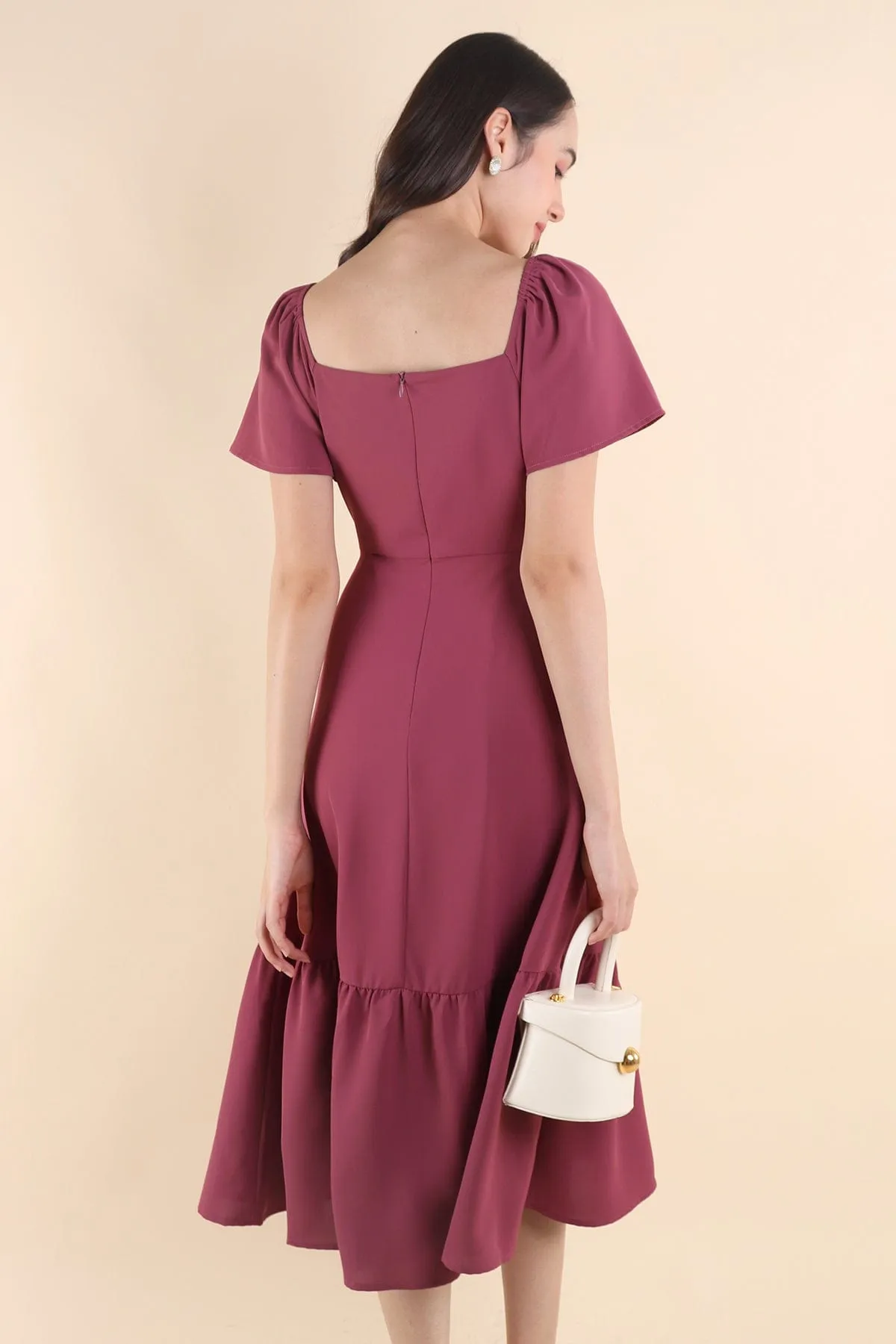 NATALY CUT-OUT MIDAXI DRESS IN MAGENTA