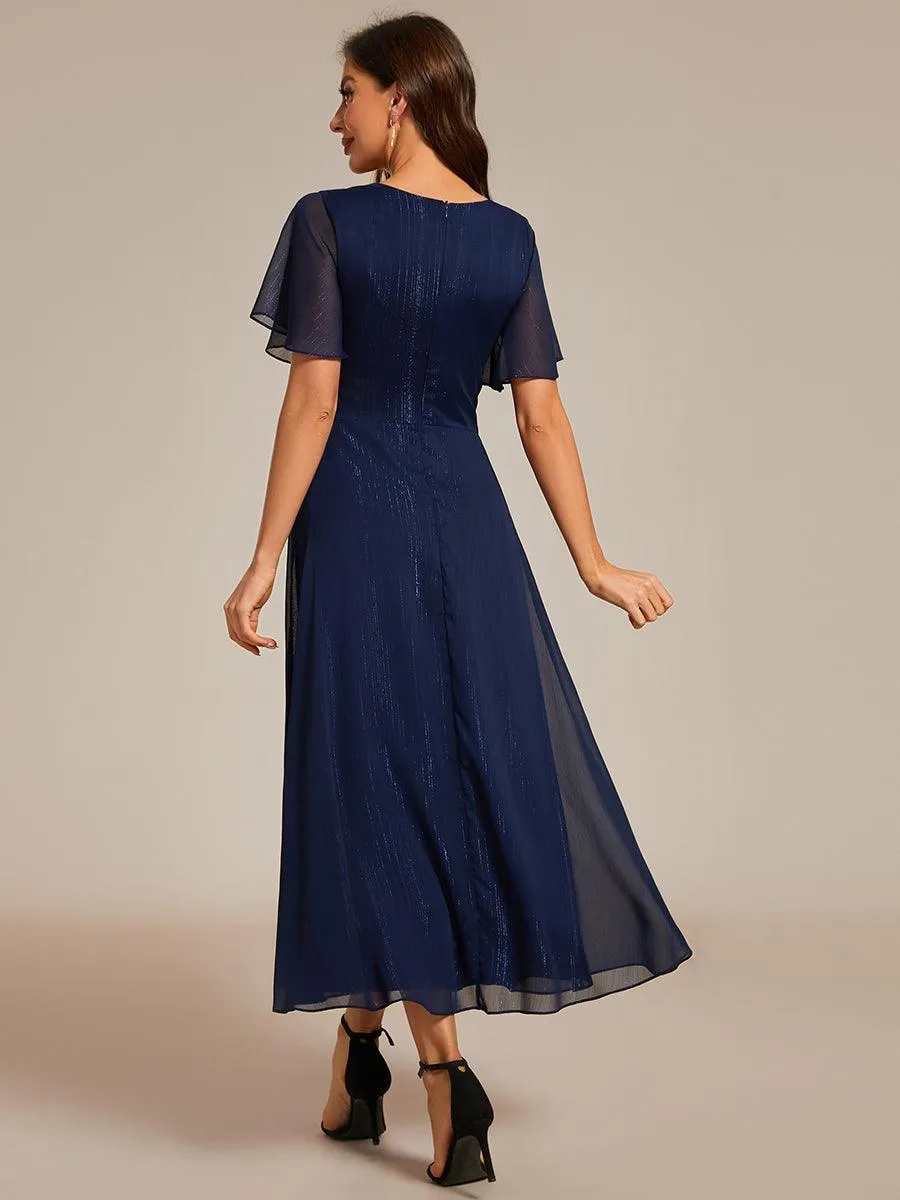 Robe d'invité de mariage mi-longue trapèze à manches courtes et paillettes avec ourlet à volants