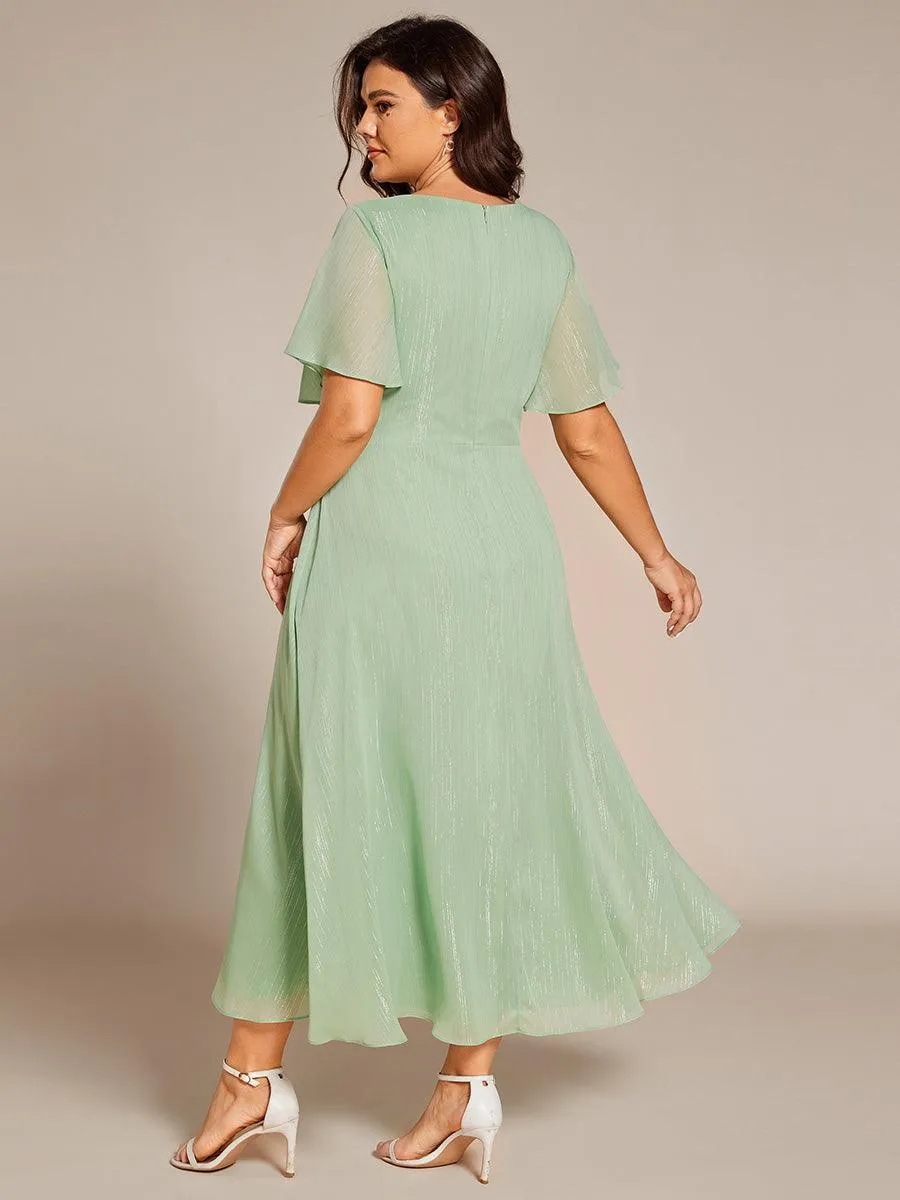 Robe d'invité de mariage mi-longue trapèze à manches courtes et paillettes avec ourlet à volants