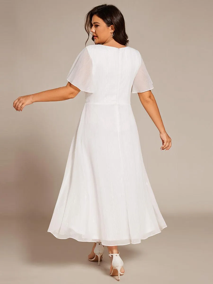 Robe d'invité de mariage mi-longue trapèze à manches courtes et paillettes avec ourlet à volants