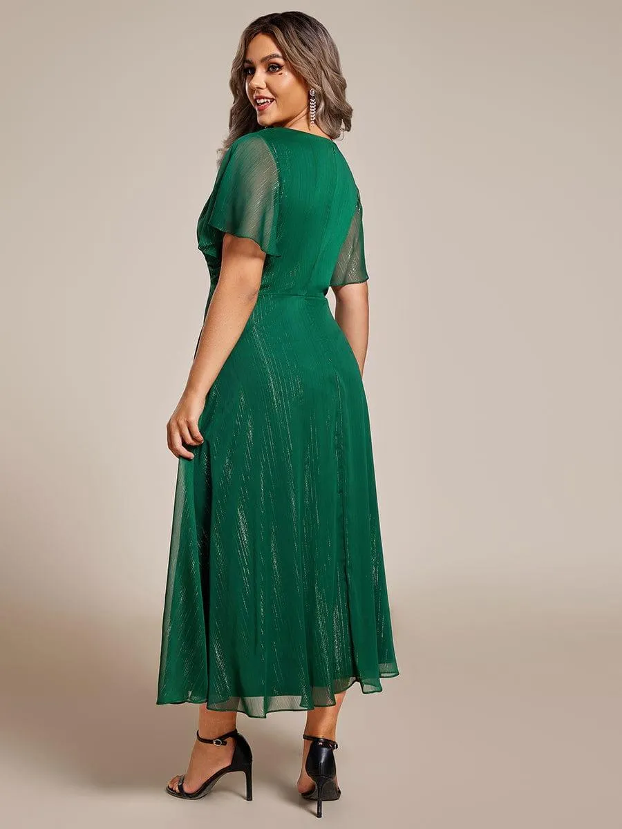 Robe d'invité de mariage mi-longue trapèze à manches courtes et paillettes avec ourlet à volants