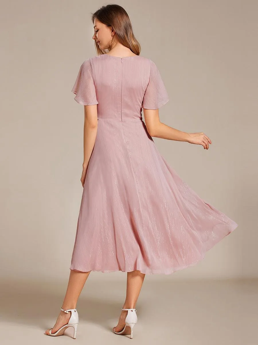 Robe d'invité de mariage mi-longue trapèze à manches courtes et paillettes avec ourlet à volants
