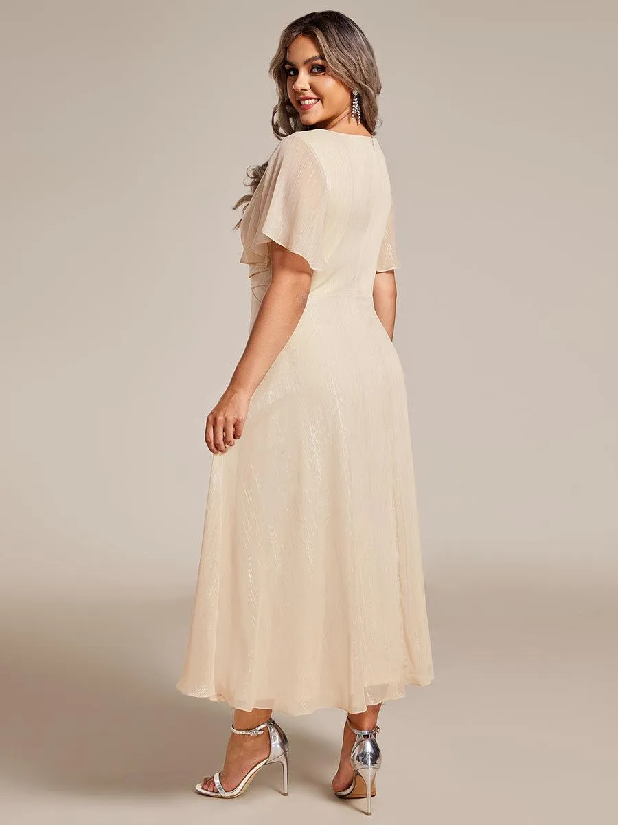 Robe d'invité de mariage mi-longue trapèze à manches courtes et paillettes avec ourlet à volants