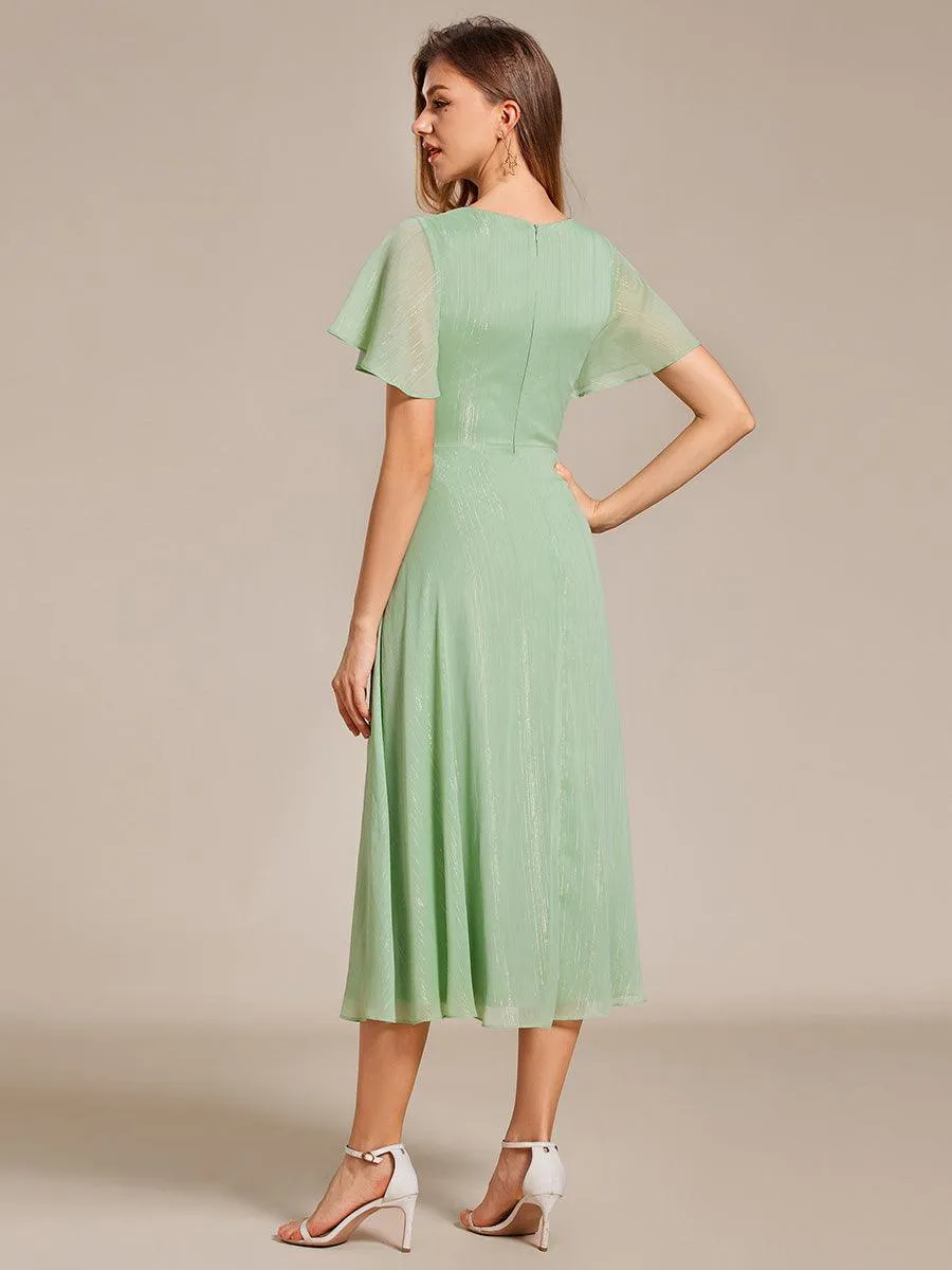 Robe d'invité de mariage mi-longue trapèze à manches courtes et paillettes avec ourlet à volants