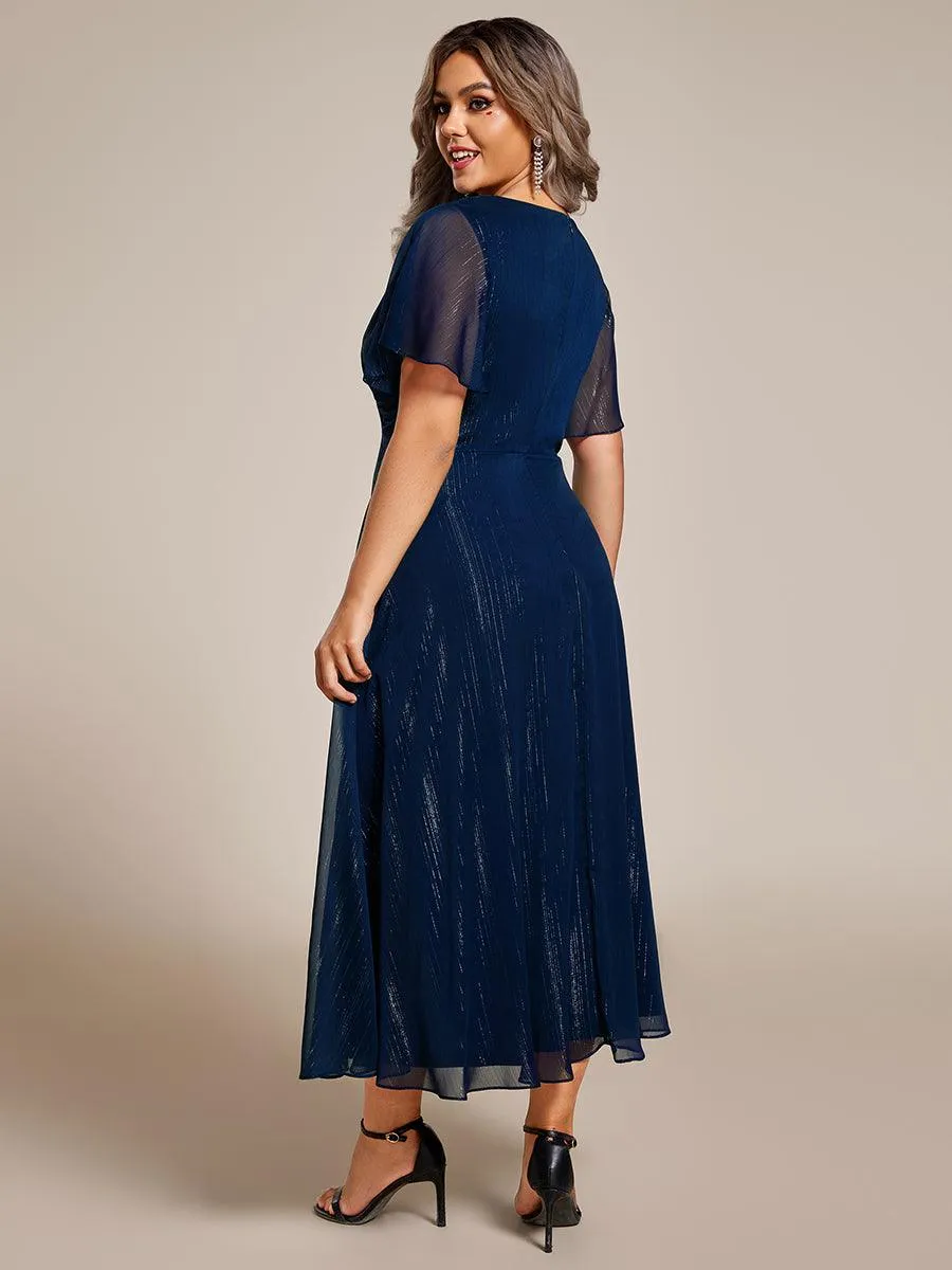 Robe d'invité de mariage mi-longue trapèze à manches courtes et paillettes avec ourlet à volants