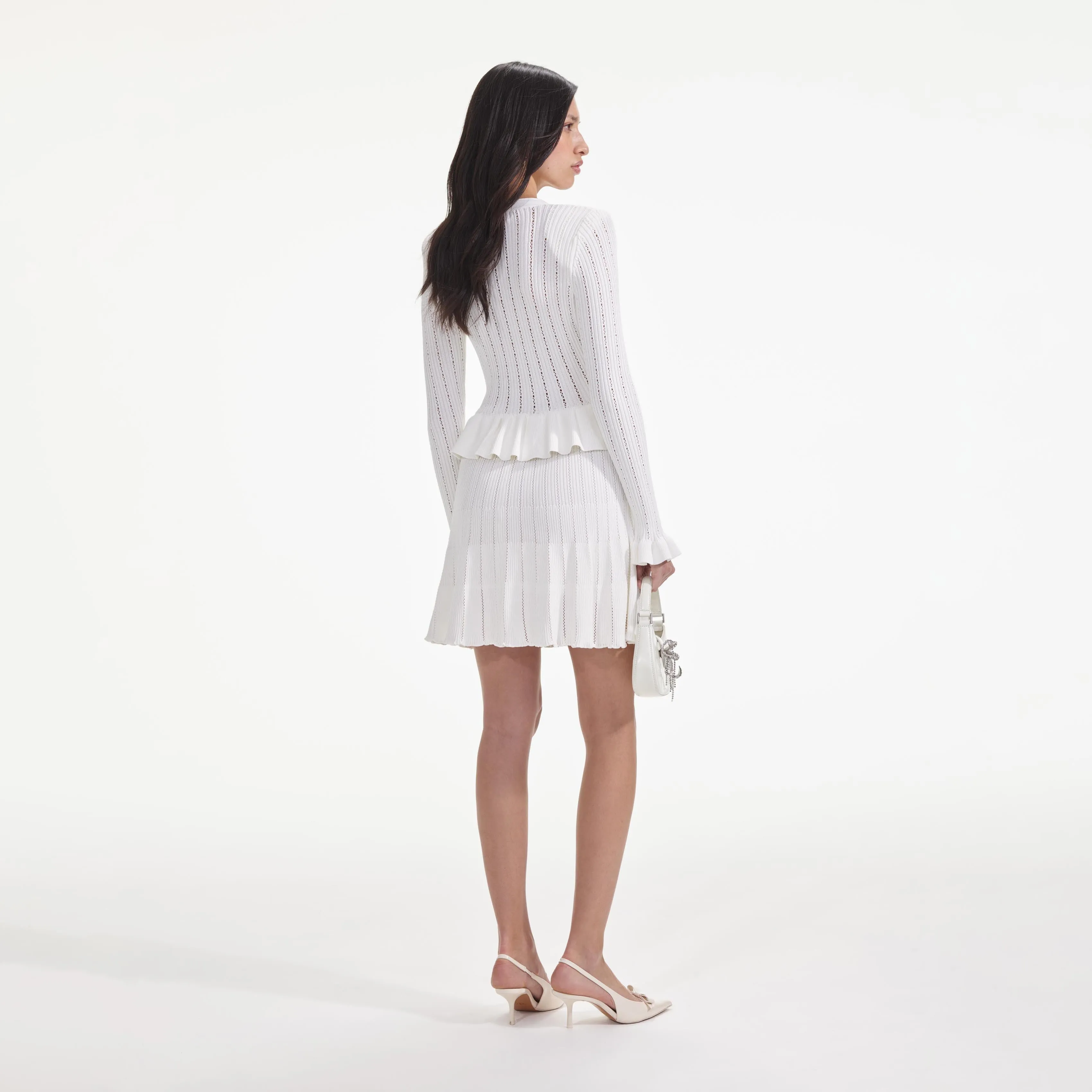 URSULA WHITE KNIT PEPLUM MINI DRESS